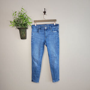 American Eagle Skinny Jegging Jeans Medium Blue Wash Mid Rise Stretch AE 12 S